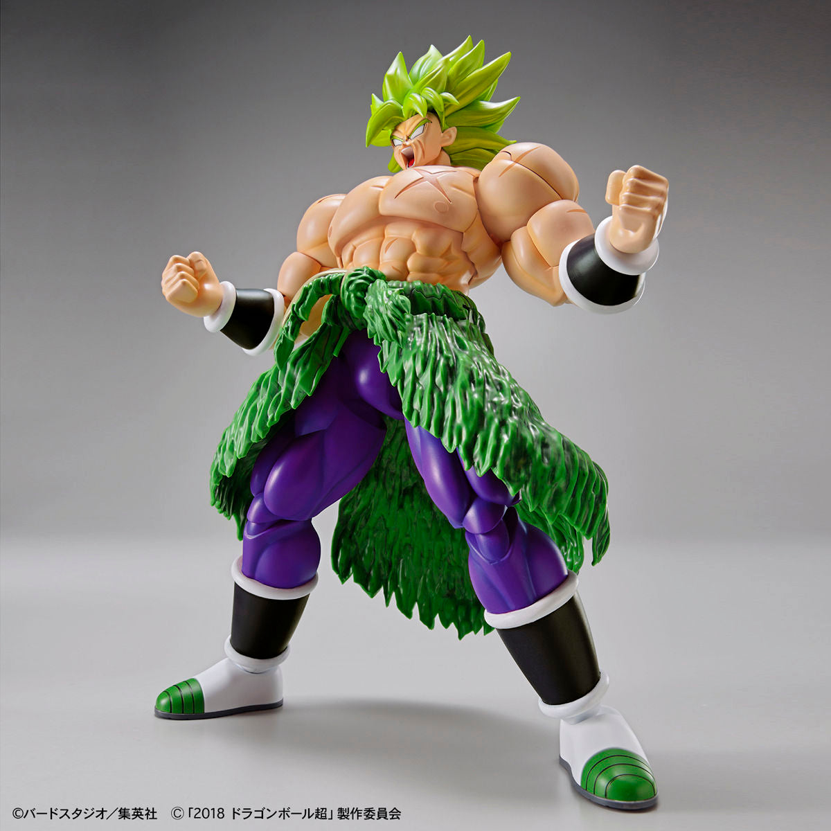 Action figure of a character from a popular anime series on a gray background