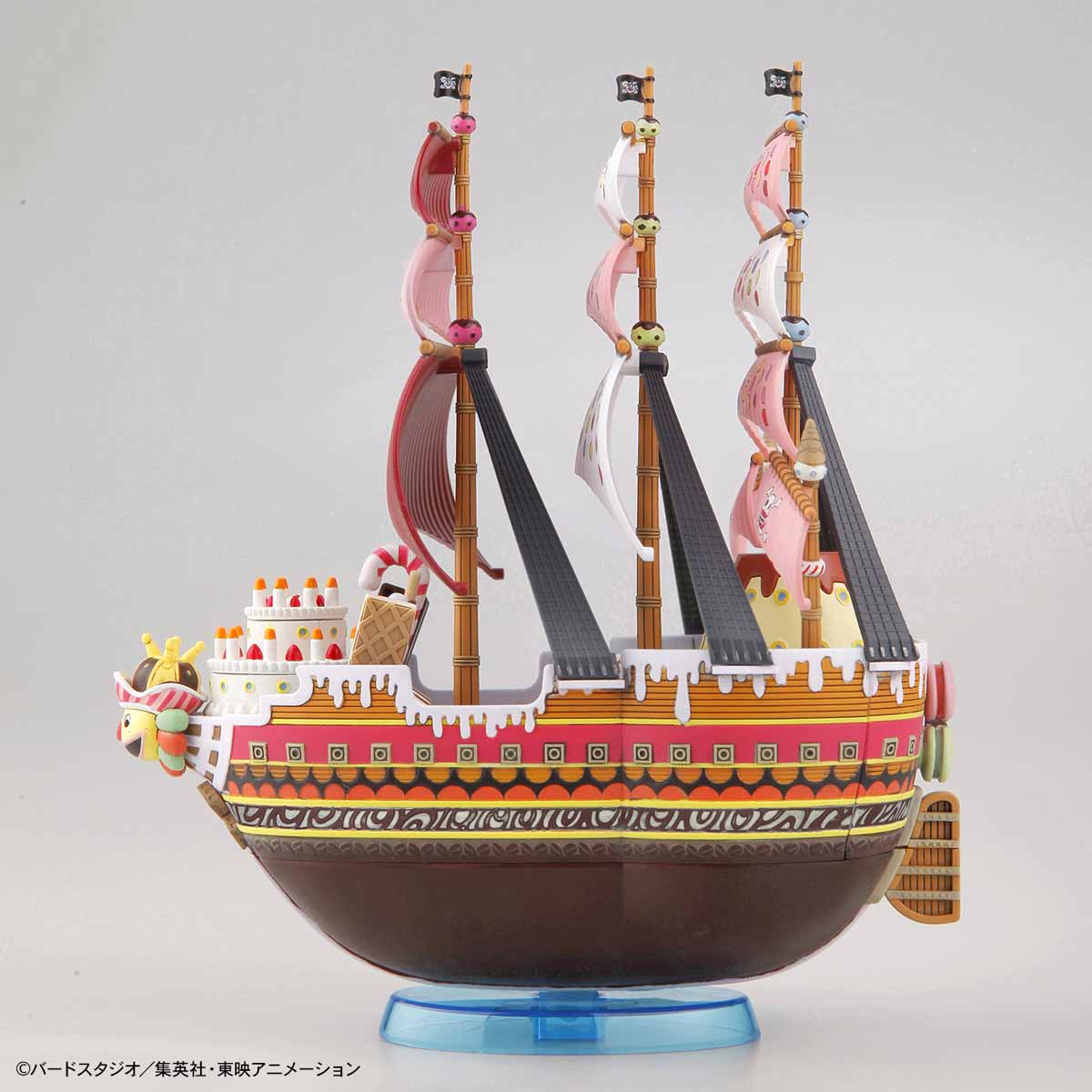 Model ship with detailed design on a gray background