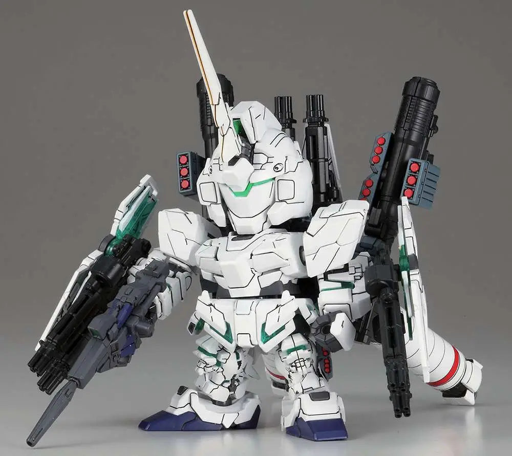 Model kit of a robot with white and gray color scheme on a gray background