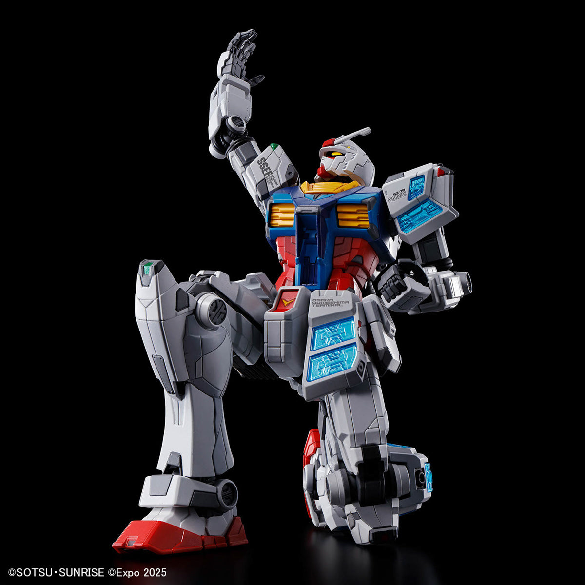 Toy robot figure on a black background
