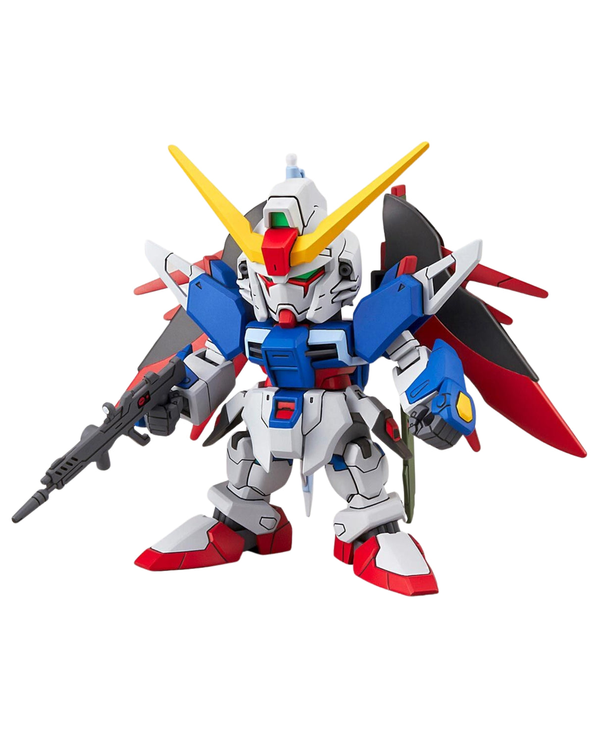 A small multicolor Gundam figurine holding a rifle, featuring a white, blue, red, and yellow color scheme, isolated on a white background.