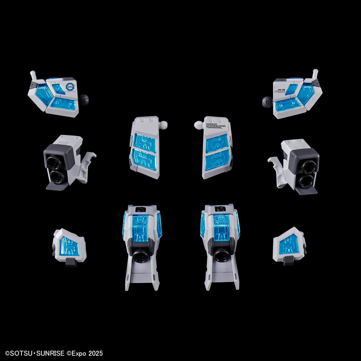 Set of small robot parts on a black background