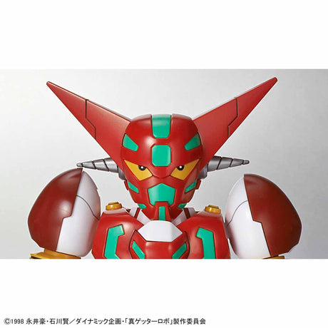 Red and green robot model with large head and pointed ears on a white background
