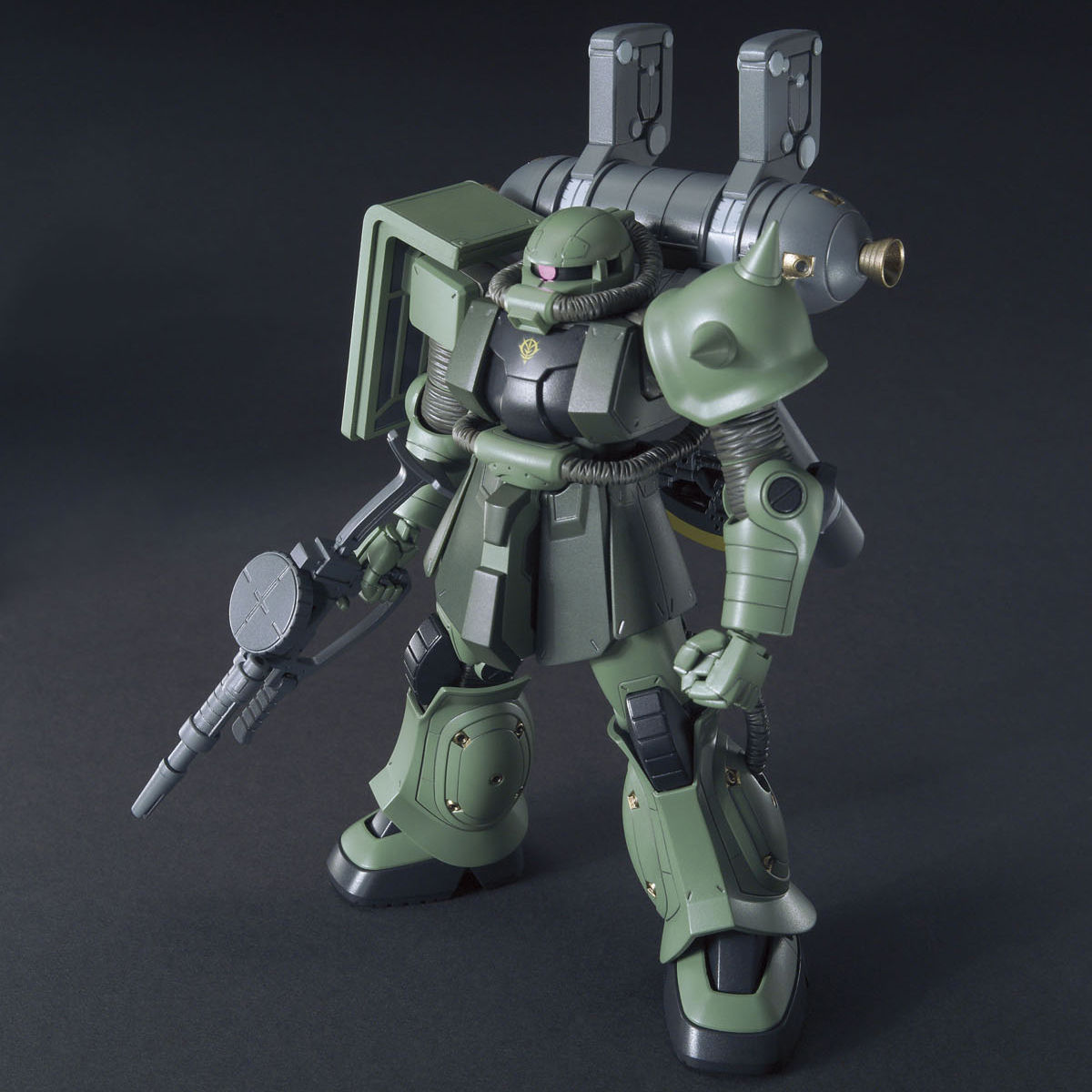 Green and gray robot model on a dark background