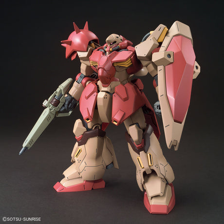 Model kit of a robot with pink and beige color scheme on a dark background
