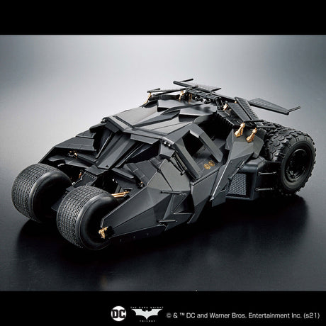Model of the Batmobile on a reflective surface with a dark background