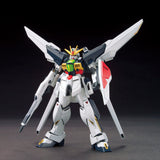 Model kit of a robot with a white and gray color scheme on a dark background