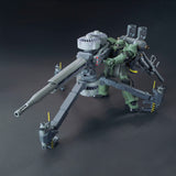 Toy robot with large weapon on a dark background