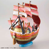 Model ship with pink sails on a white background