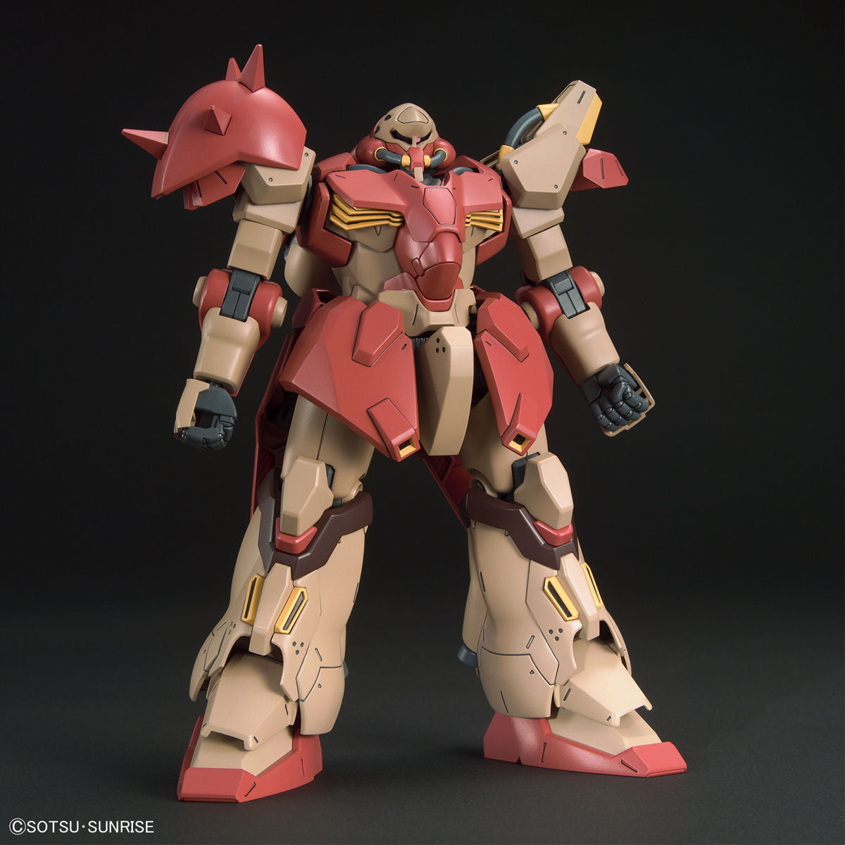 Mechanical robot model with red and beige colors on a black background