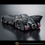 Model of the Batmobile on a reflective surface with a gray background