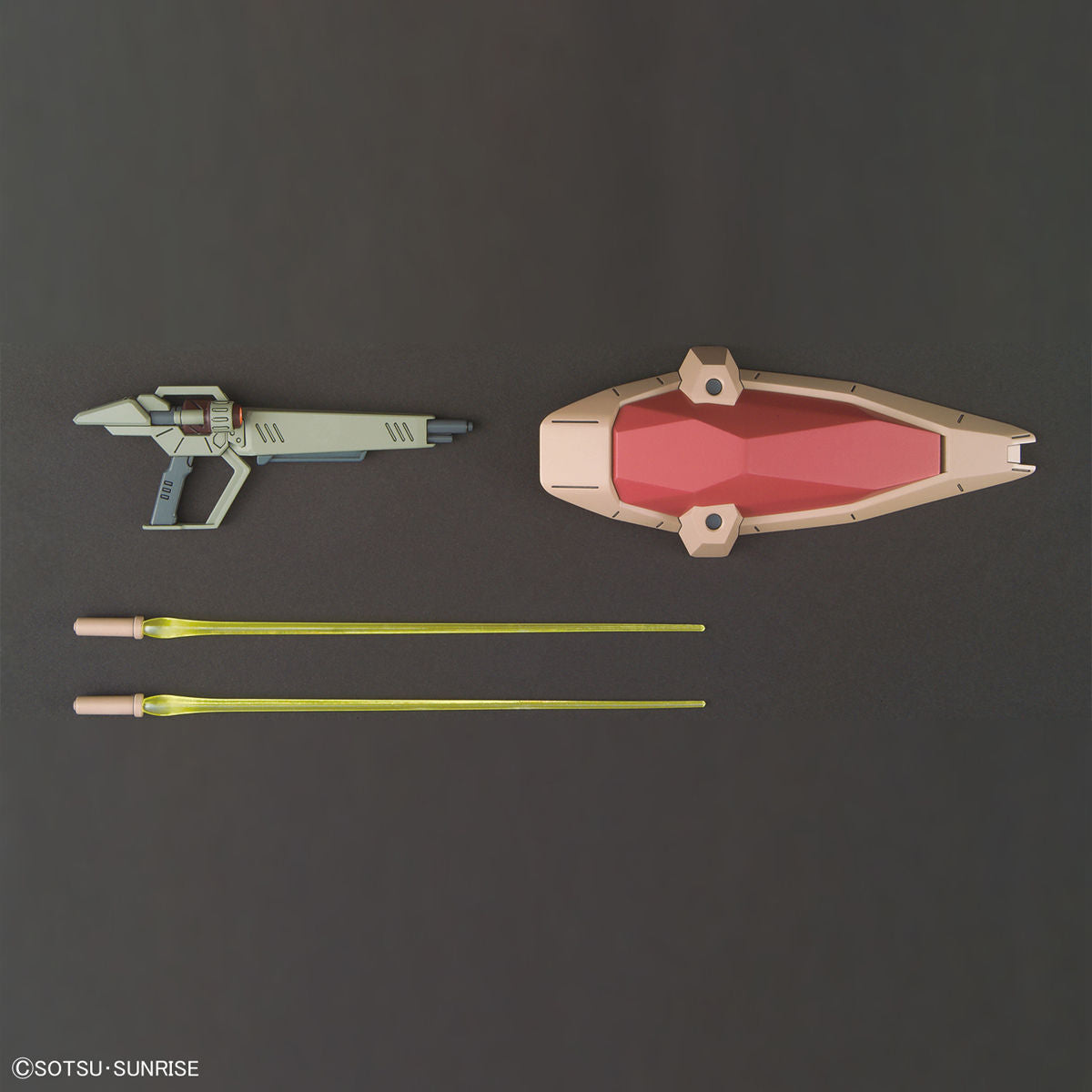 Toy model of a spaceship and two light sabers on a dark background