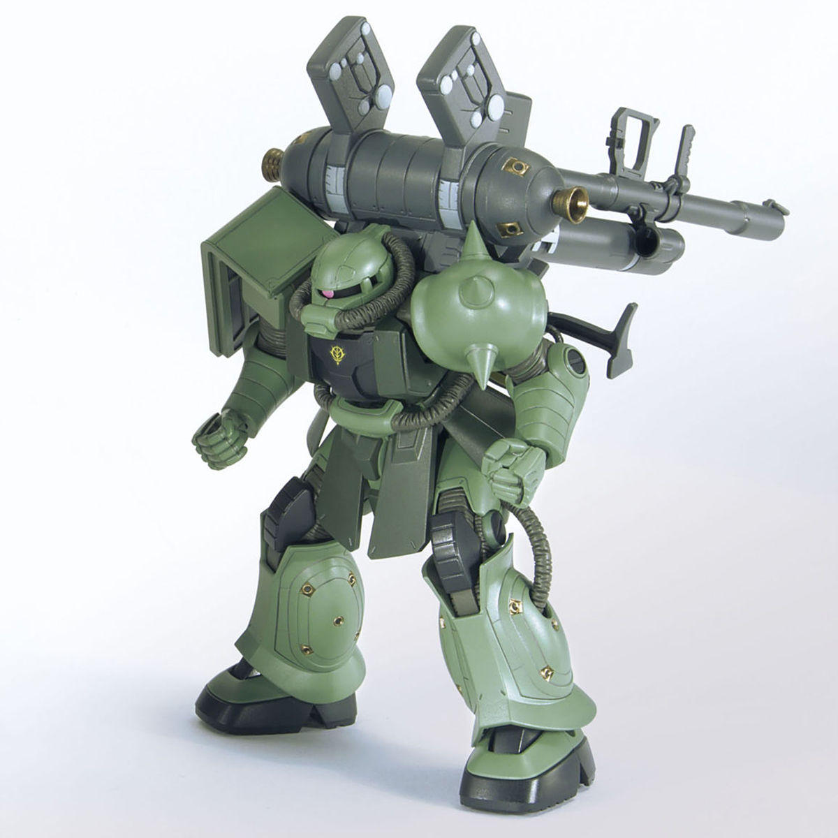 Green robot model with a large weapon on a white background