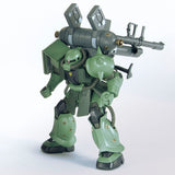 Green robot model with a large weapon on a white background