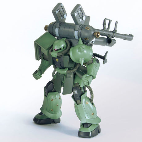 Green robot model with a large weapon on a white background