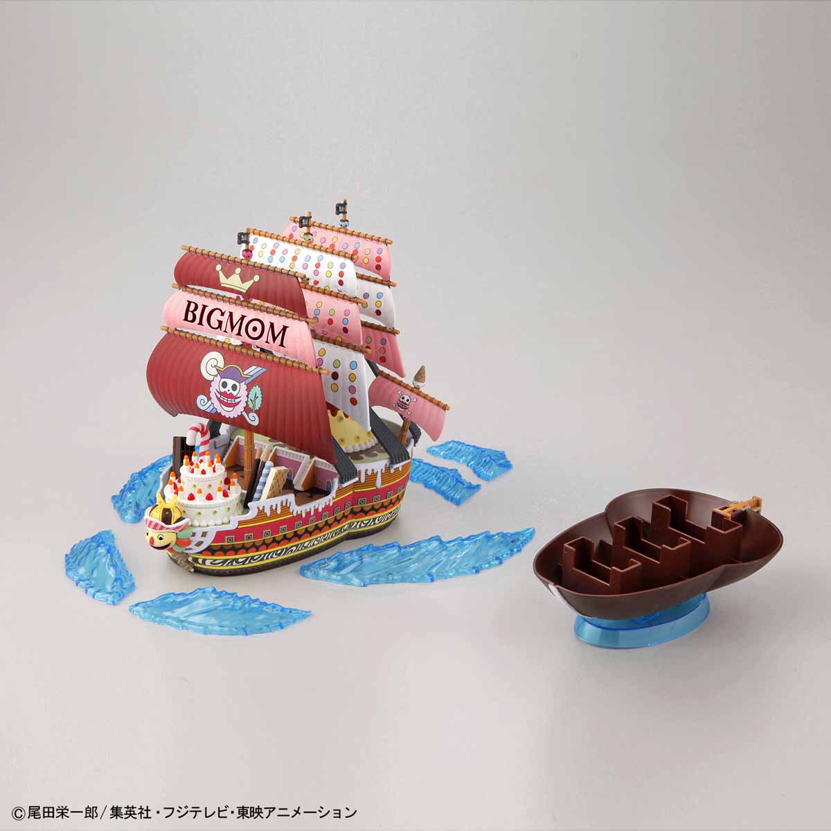 Model ship with 'BIGMOM' on a gray background