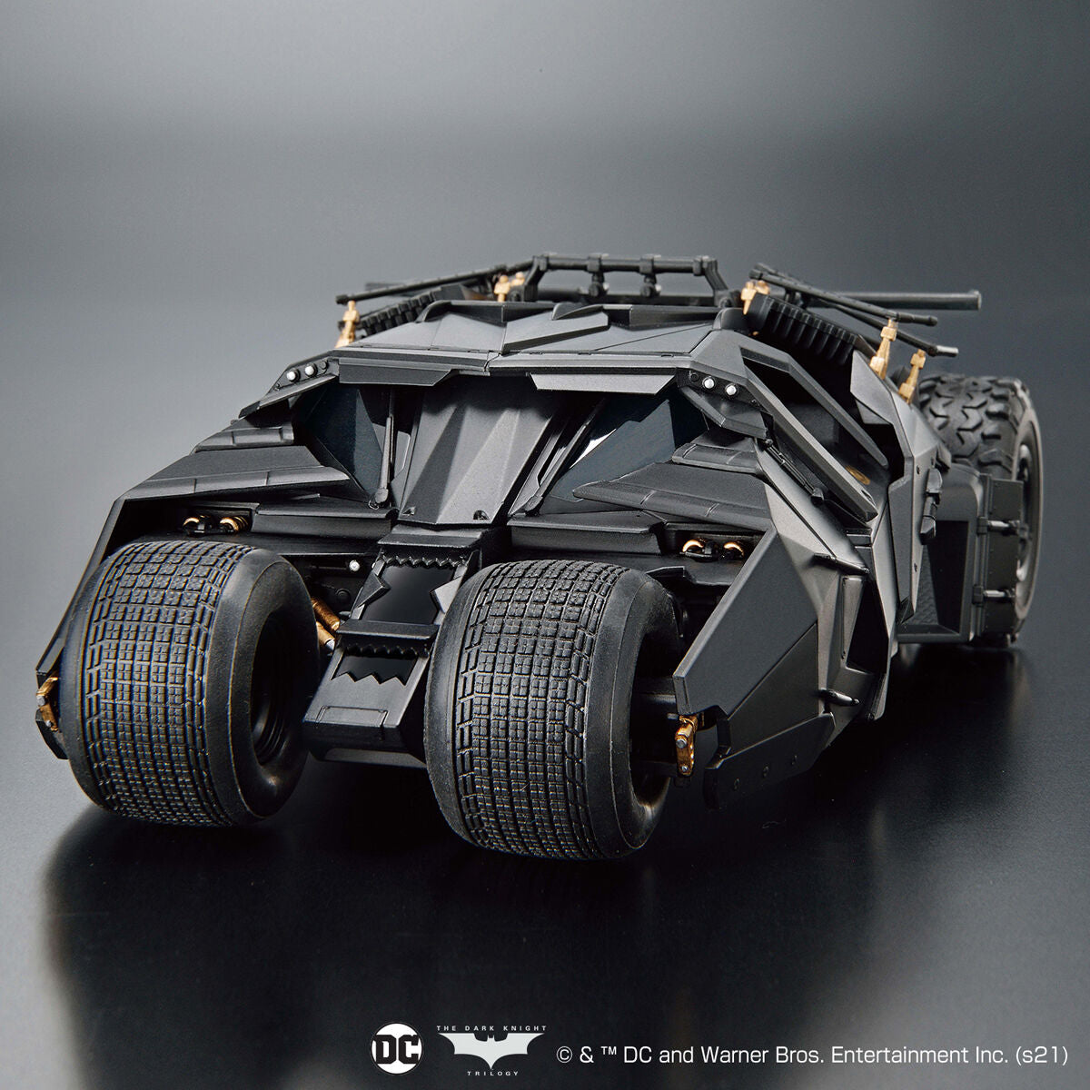 Black Batmobile model on a dark background