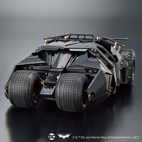 Black Batmobile model on a dark background