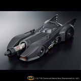 Model of the Batmobile on a reflective surface with a dark background