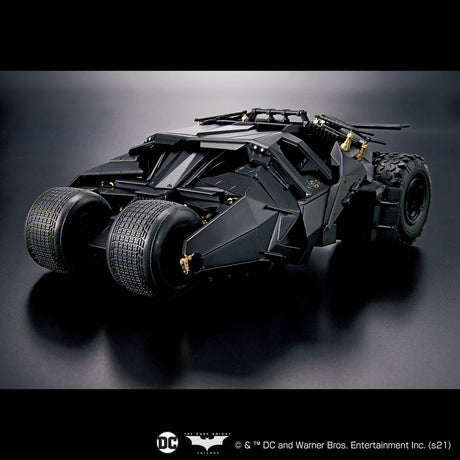 Black Batmobile model on a dark background with DC logo.
