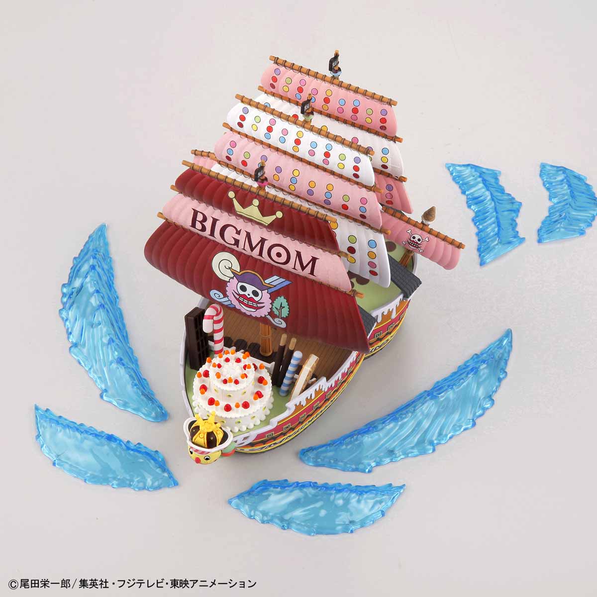 Model ship with 'BIGMOM' on a white background