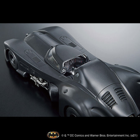 Gray Batmobile model on a black background