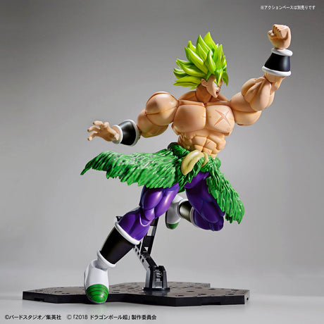 Action figure of a character with green hair and purple outfit on a gray background