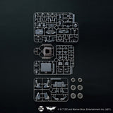 Model kit components on a black background with DC Comics logo.