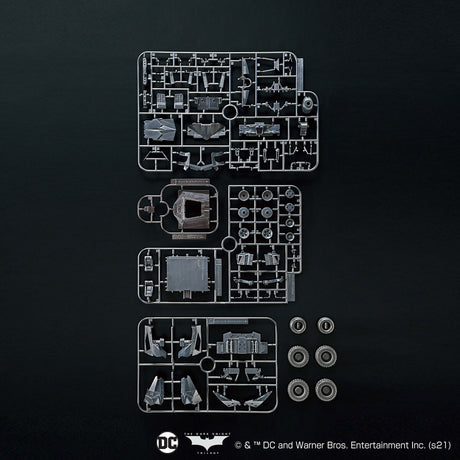 Model kit components on a black background with DC Comics logo.