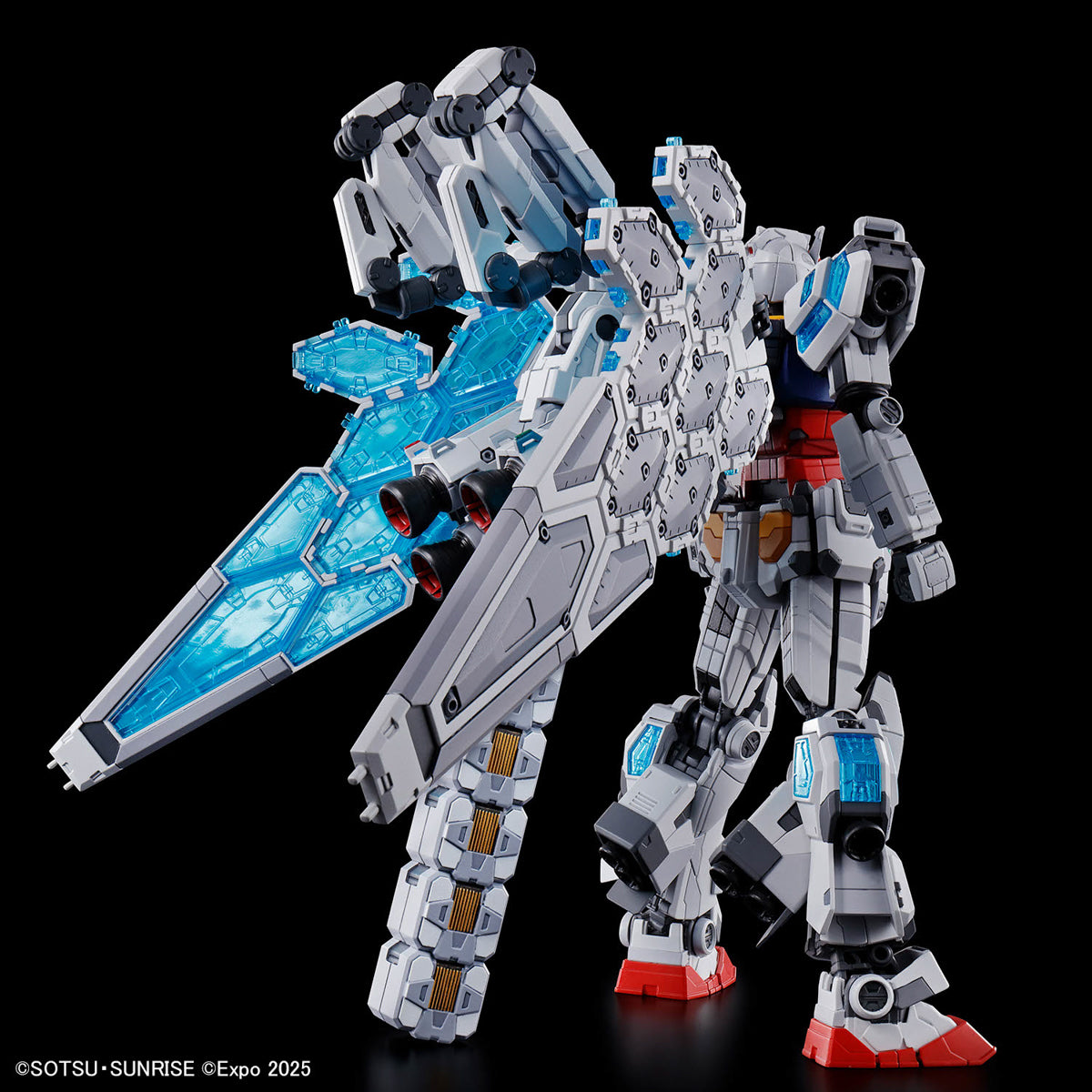 Mechanical robot model with blue weapon on a black background