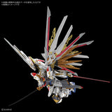 A highly detailed Gundam model kit shown from a dynamic three-quarter angle against a solid black background. The model features a white and gold body with red, brown, and blue accents, and is equipped with multiple large blades and a long sword.