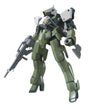 A plastic model kit of the Mobile Suit Gundam character in green armor with a rifle and a battle axe.