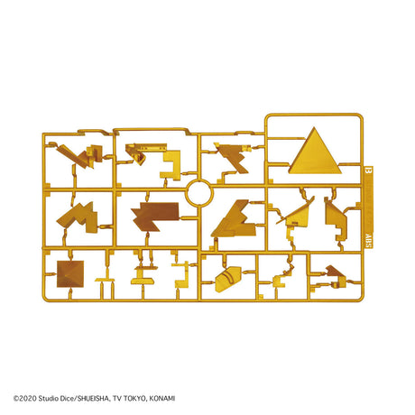 Gold toy assembly sheet with various parts on a white background