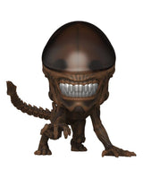 A stylized Alien Xenomorph collectible figure with a glossy dark brown dome head, textured brown body, and sharp white teeth, shown against a plain white background.