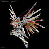 A highly detailed white Gundam model figure with gold, red, and blue accents, posed dynamically against a solid black background. The figure is holding a long black sword with a red hilt.