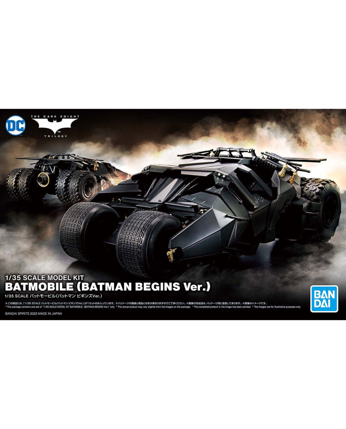 Front packaging artwork for a 1/35 scale model kit of the Batmobile from Batman Begins. The box art features a dramatic black armored vehicle in a smoky battle scene, with the DC logo at top left and the Bandai logo at bottom right.