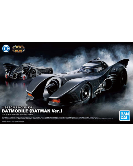 Front packaging artwork for a 1/25 scale model kit of the Batman Batmobile, featuring a dark black and gray futuristic car on a smoky black background, with DC and Bandai logos visible.