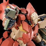 Close-up of a red and beige robot model with detailed features on a black background
