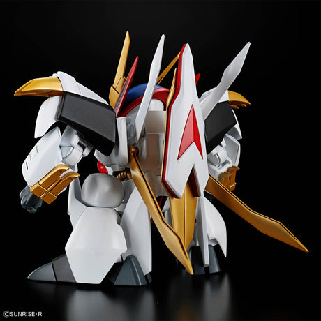 Model kit of a robot with gold, white, and red details on a black background
