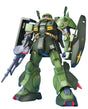 A green mobile robot action figure or model kit shown standing on a plain white background, holding a gray rifle and large dark shields, with small red, yellow, and blue accents.