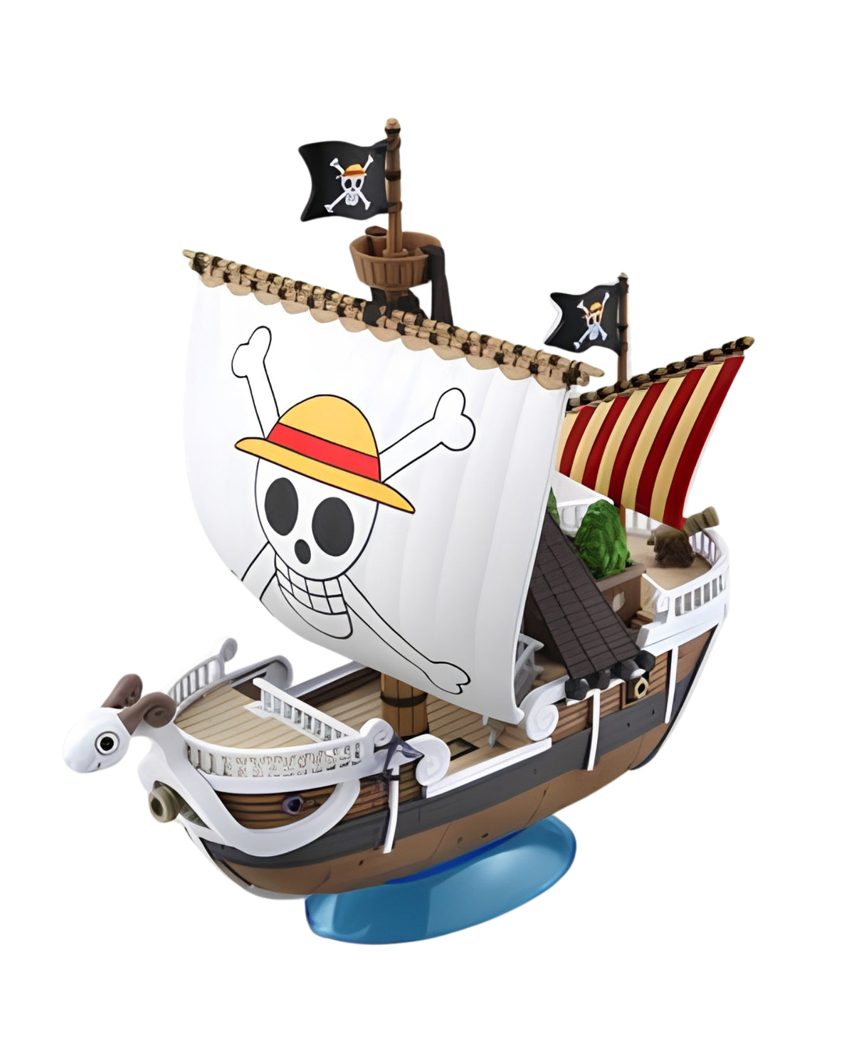 A small wooden toy pirate ship displayed on a blue stand against a plain white background. The ship has a large white sail printed with a skull-and-crossbones wearing a yellow straw hat, plus black pirate flags and striped sails.