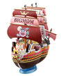 A toy ship model styled as the One Piece character Big Mom, featuring pink sails, a decorated hull, and a blue stand, shown on a plain white background.