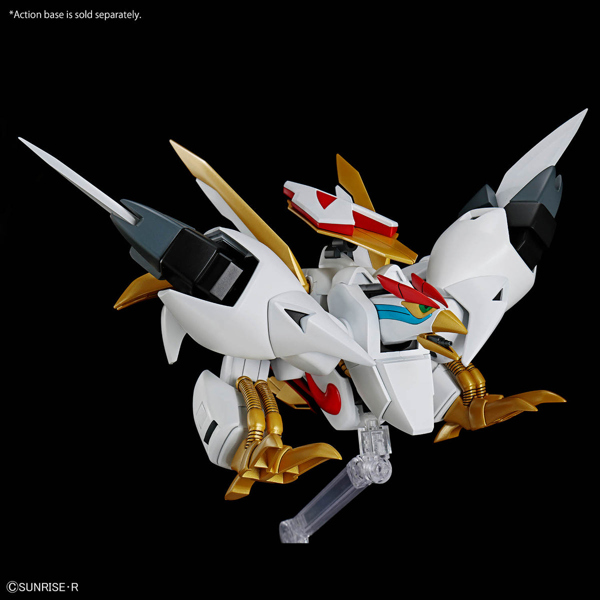Model kit of a robot with white, gold, and red colors on a black background