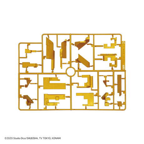 Gold-colored model kit piece on a white background