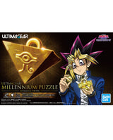 Ultimagine Gear Millennium Puzzle toy packaging featuring Yu-Gi-Oh! character Seto Kaiba holding a gold puzzle piece next to a large golden Millennium Puzzle emblem on a dark background. Visible brands include Ultimagine Gear, Yu-Gi-Oh!, and Bandai.