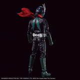Shin Kamen Rider action figure shown from the back against a solid black background, wearing a black bodysuit with teal accents, a silver belt, and a red cape.