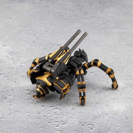 Black and yellow spider-like robot toy on a gray surface