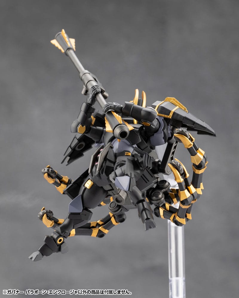 Mechanical model figure with black and gold details on a gray background