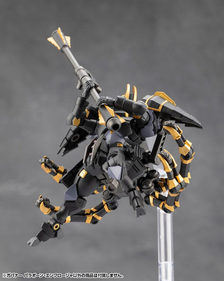Mechanical model figure with black and gold details on a gray background