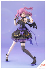 Anime character figurine with pink hair and black and purple outfit on a light purple background